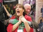 Jackie from Briers gets a Glovie embrace from Hillier's Andy McIndoe